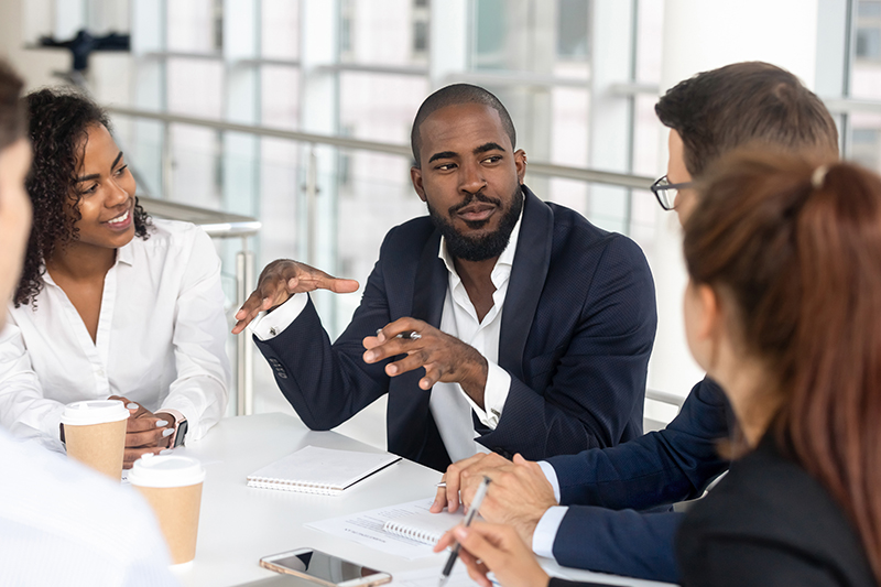 Small group meeting at table
