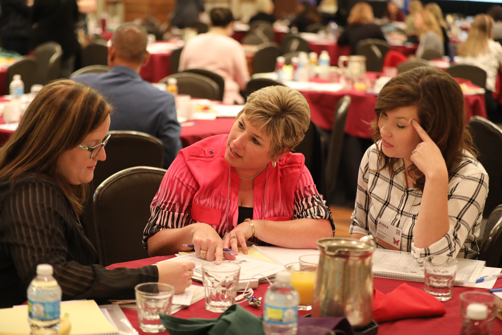 Participants talking at table