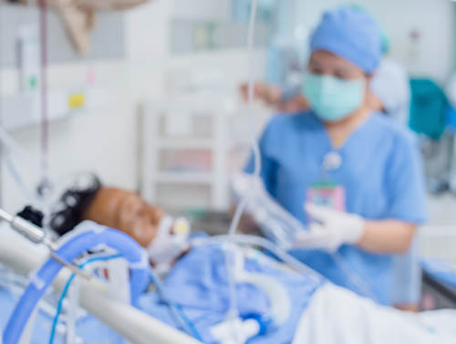 Patient in hospital bed