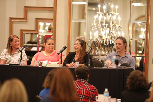 Panel members at conference